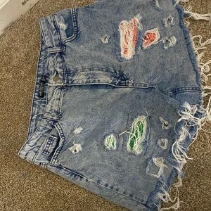 Nasty Gal Blue Distressed Jean Shorts with Red and Green Accents